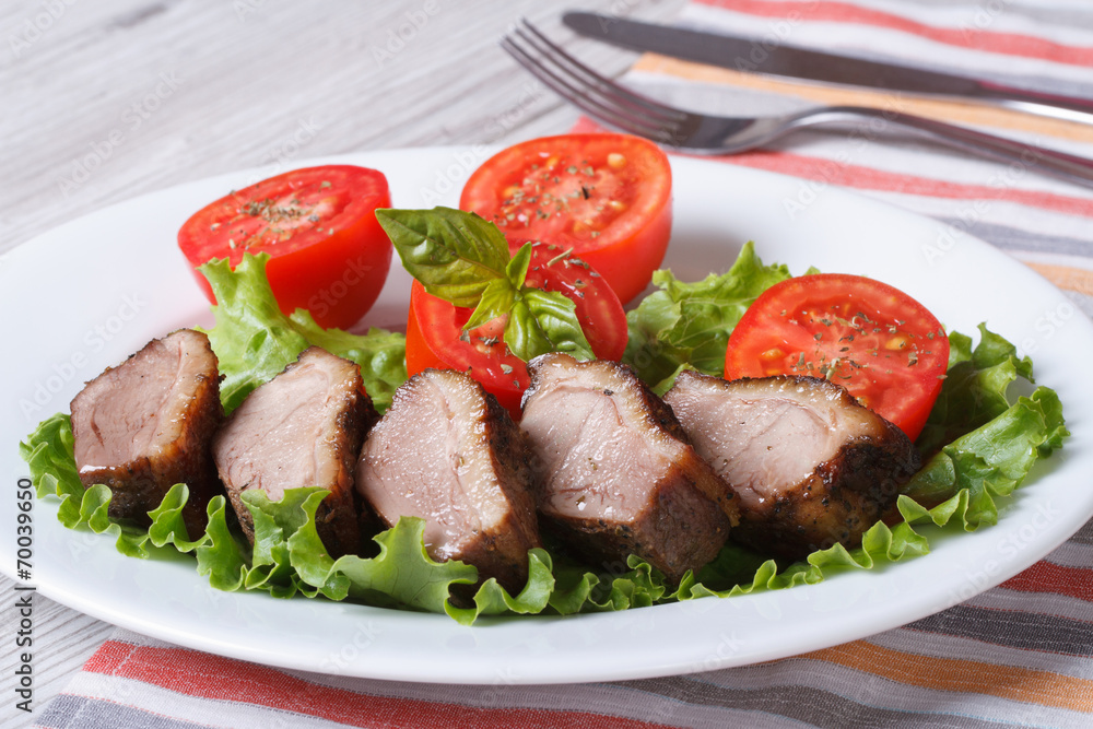 duck meat fried with tomato and basil close-up horizontal duck meat fried with tomato and basil close-up horizontal