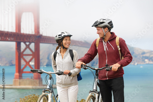 Canvas Print Biking Golden Gate Bridge - couple sightseeing