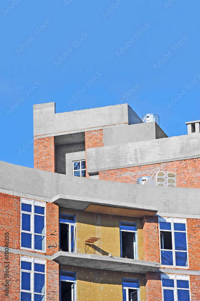 Building construction site work against blue sky Building construction site work against blue sky