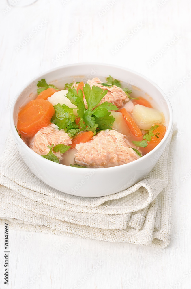 Fish soup with salmon in bowl Fish soup with salmon in bowl
