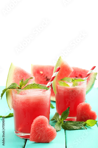 Watermelon cocktail on table, isolated on white