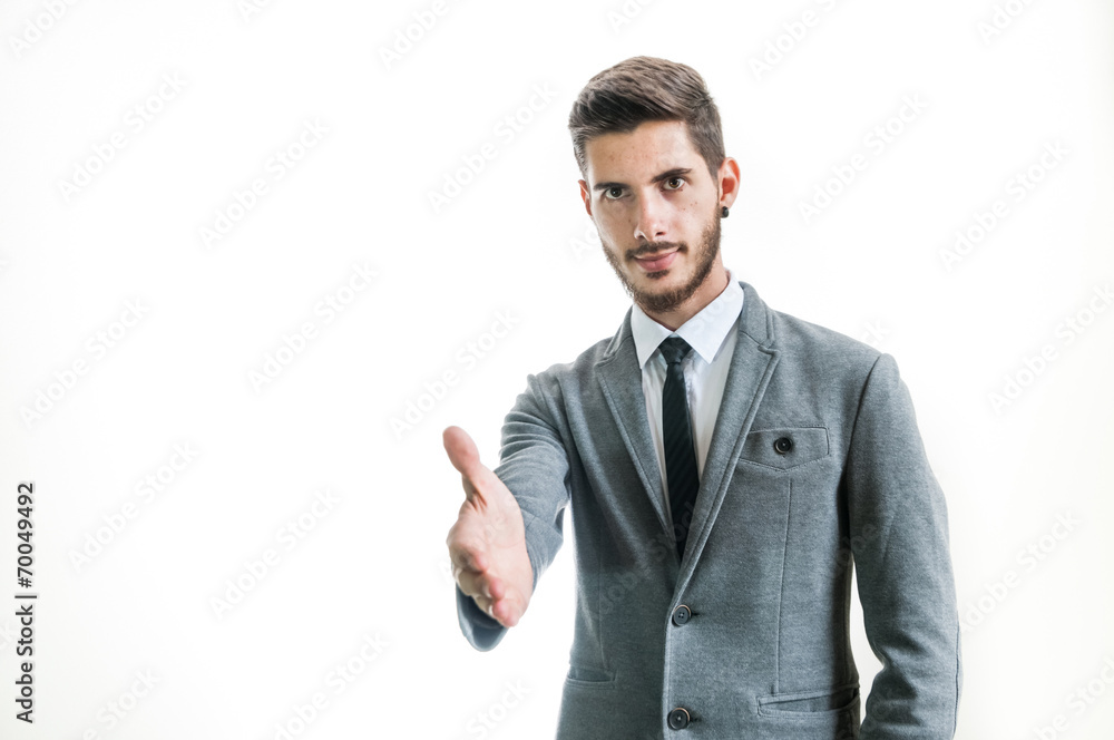 Young successful businessman handshake isolated on white Young successful businessman handshake isolated on white