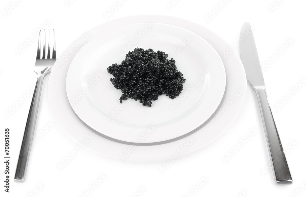 Black caviar on plate, fork and knife isolated on white Black caviar on plate, fork and knife isolated on white