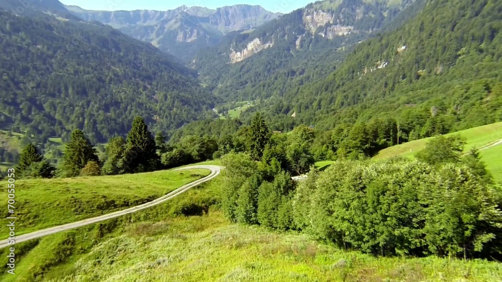 flying over green alpine landscape flying over green alpine landscape
