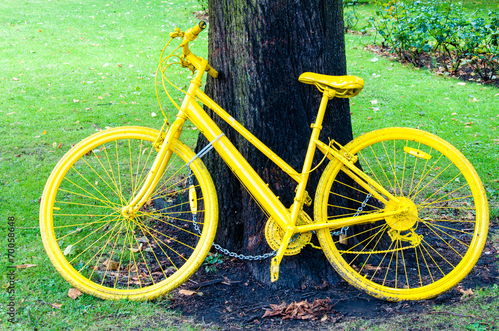 Yellow bicycle exposed on York city walls, England Yellow bicycle exposed on York city walls, England