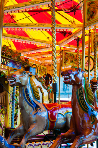 View of Carousel with horses on a carnival Merry Go Round
