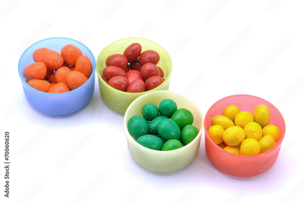 Various Color Of Chocolate Beans In Plastic Container Various Color Of Chocolate Beans In Plastic Container