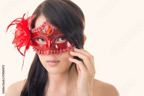woman in a carnival mask