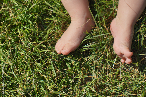 Baby feet on grass