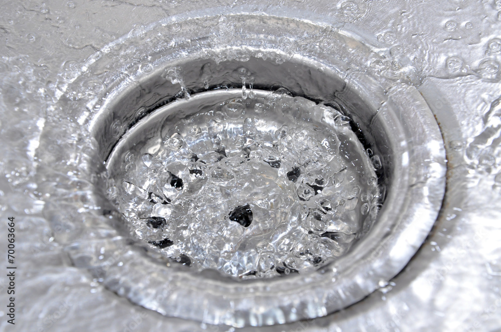 Water Flowing Down In The Hole In A Kitchen Sink Water Flowing Down In The Hole In A Kitchen Sink