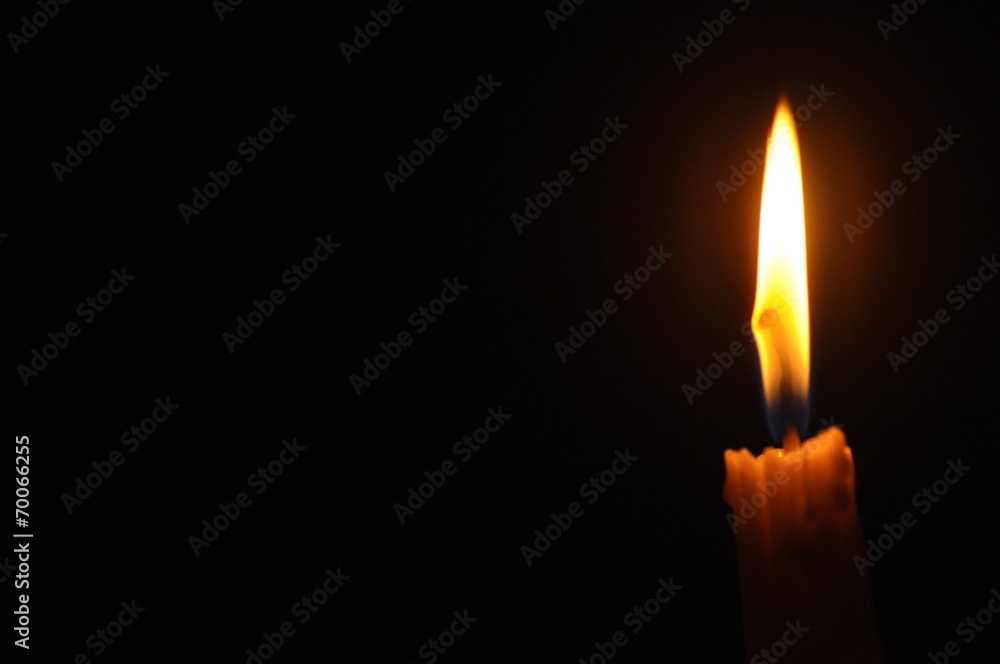 Close Up Candle With Creative Flame Over Dark Background (Noise Close Up Candle With Creative Flame Over Dark Background (Noise