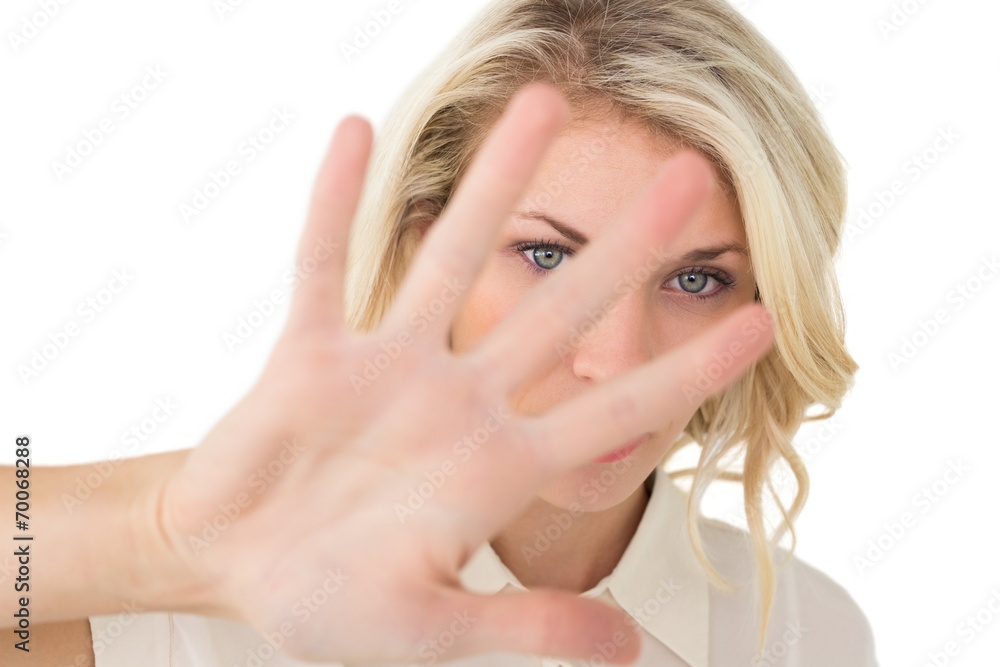 Portrait of young woman signals stop Portrait of young woman signals stop