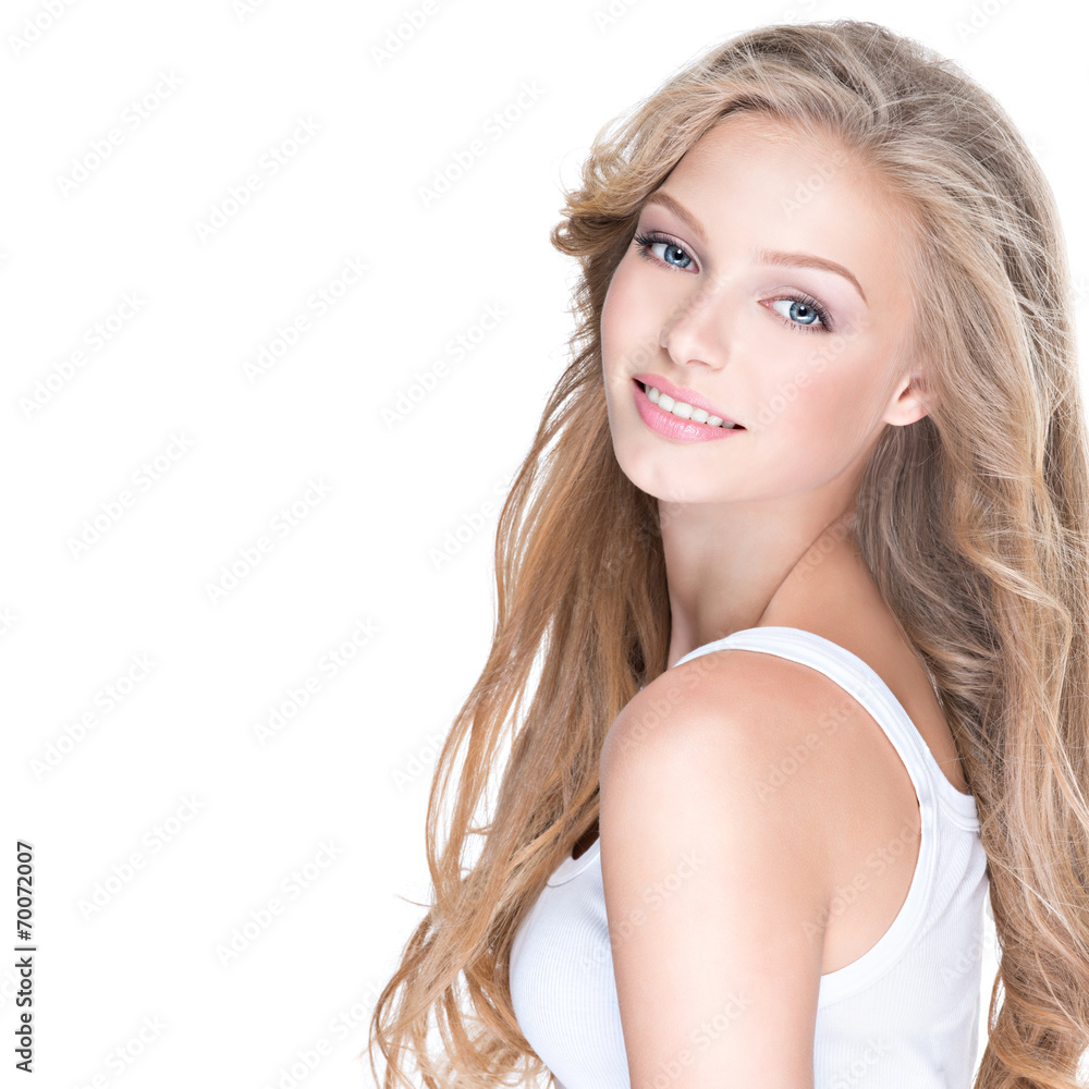 Beautiful happy woman with long curly hair. Beautiful happy woman with long curly hair.