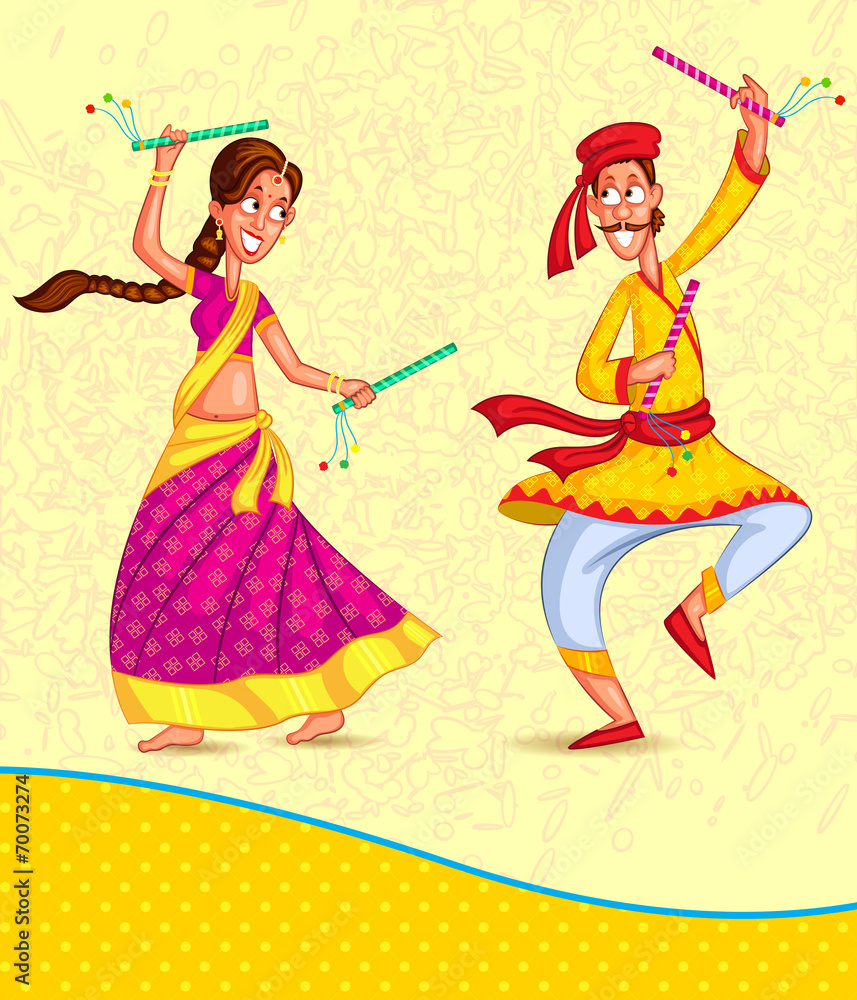 Couple performing Dandiya