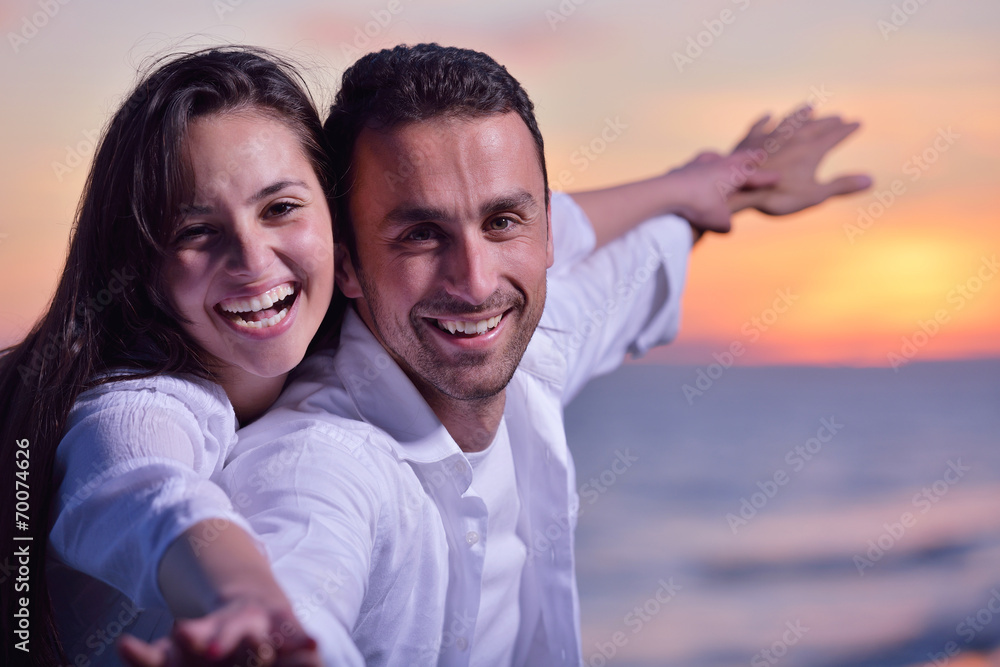 young couple on beach have fun young couple on beach have fun