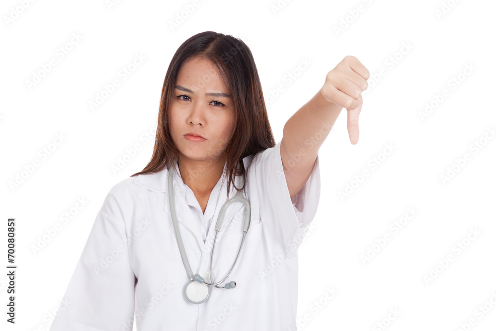 Young Asian female doctor angry show thumbs down Young Asian female doctor angry show thumbs down