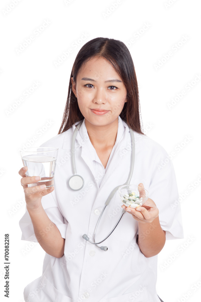 Young Asian female doctor with water and medicine Young Asian female doctor with water and medicine