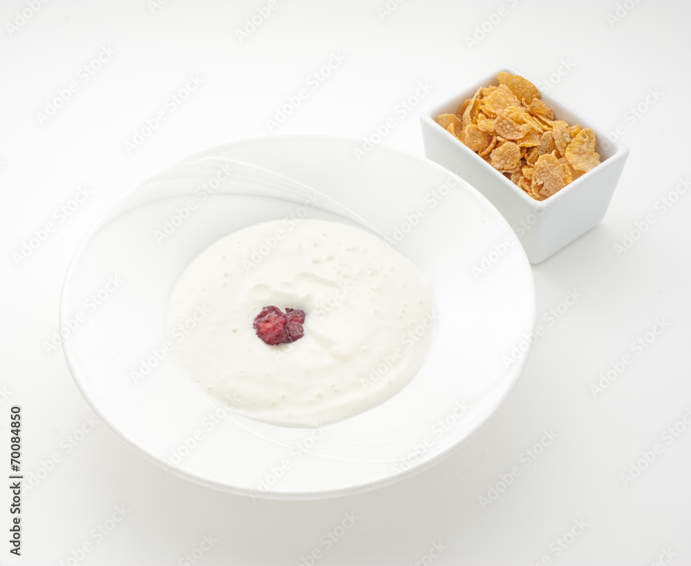 Plate of yogurt and oatmeal isolated on white Plate of yogurt and oatmeal isolated on white