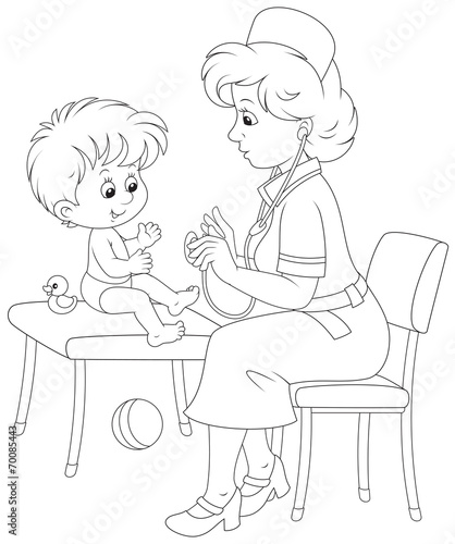 Pediatrician examines a little child