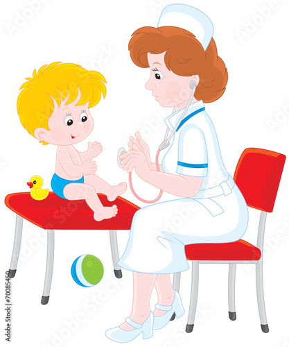 Pediatrician examines a little child