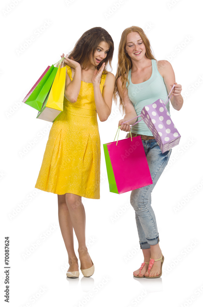 Friends with shopping bags isolated on white Friends with shopping bags isolated on white