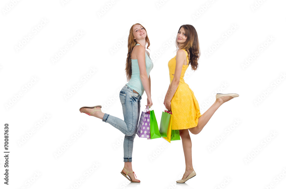 Friends with shopping bags isolated on white Friends with shopping bags isolated on white