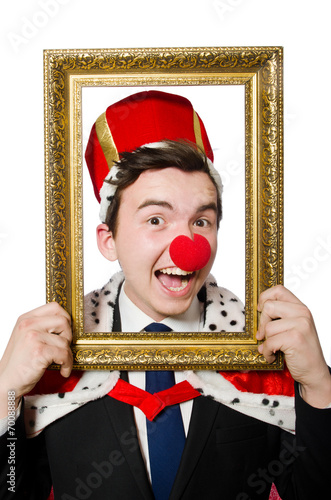 Funny businessman with clown nose