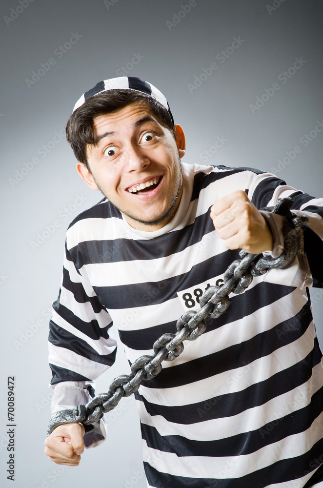 Funny prison inmate in concept Funny prison inmate in concept