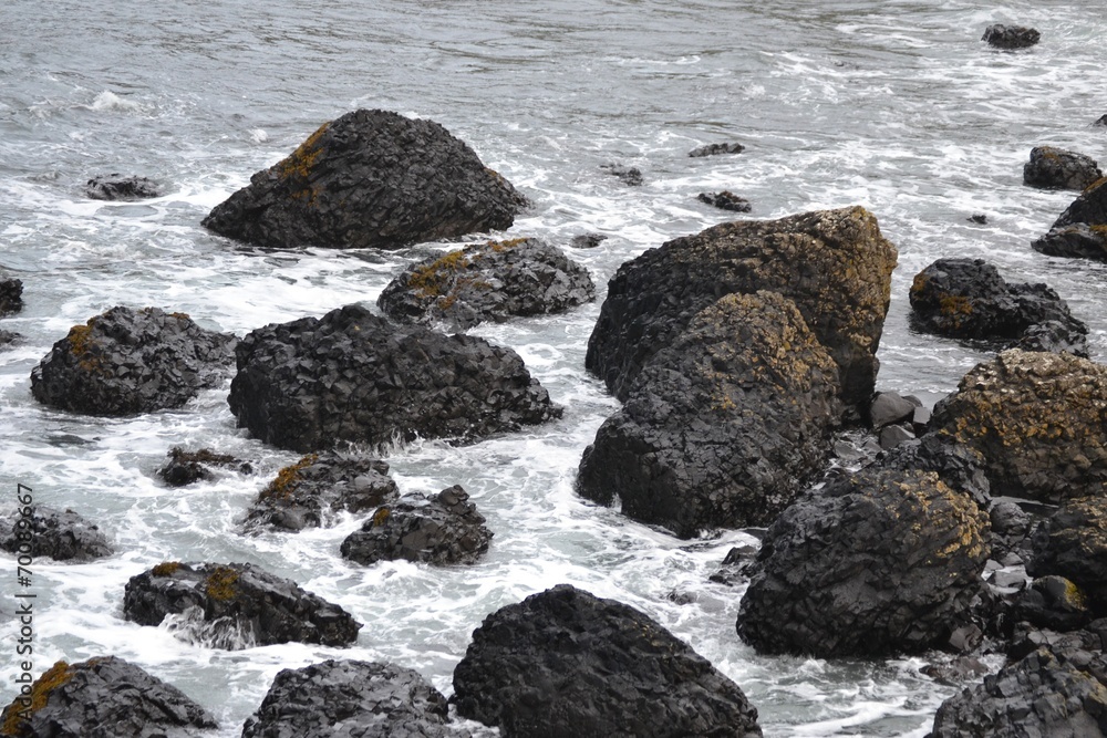 Black Rocks Dotting the Coastline of Northern Ireland