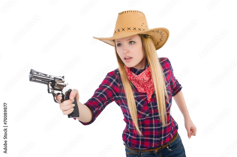 Cowgirl woman with gun isolated on white Cowgirl woman with gun isolated on white