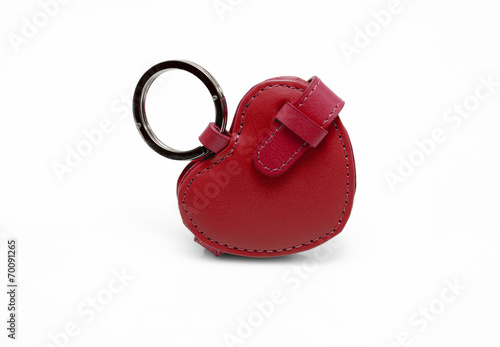 Vászonkép Red leather trinket isolated on white