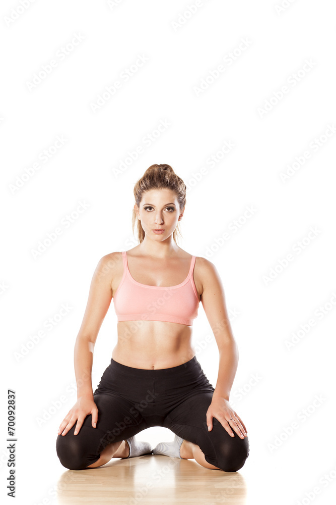 young attractive girl doing yoga exercises young attractive girl doing yoga exercises