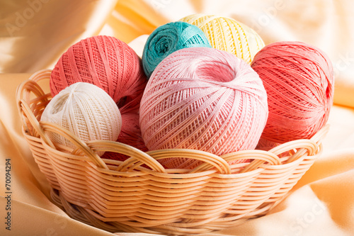 Colorful cotton yarn in the basket (close up shot)