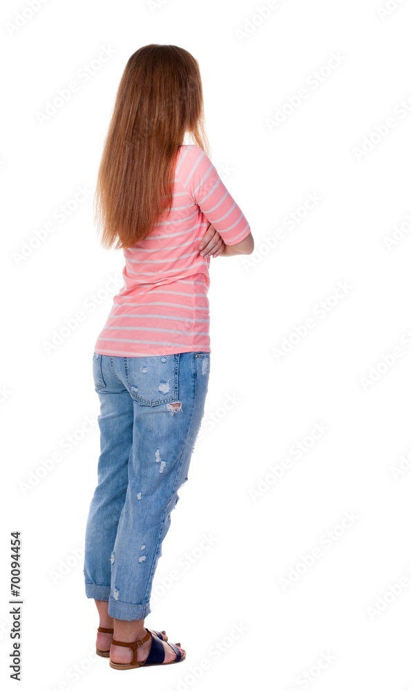 back view of standing young beautiful redhead woman. back view of standing young beautiful redhead woman.