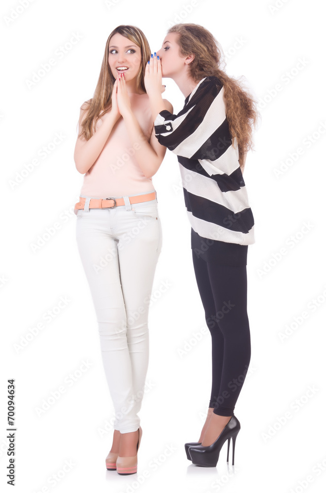 Fototapeta premium Two female friends isolated on the white