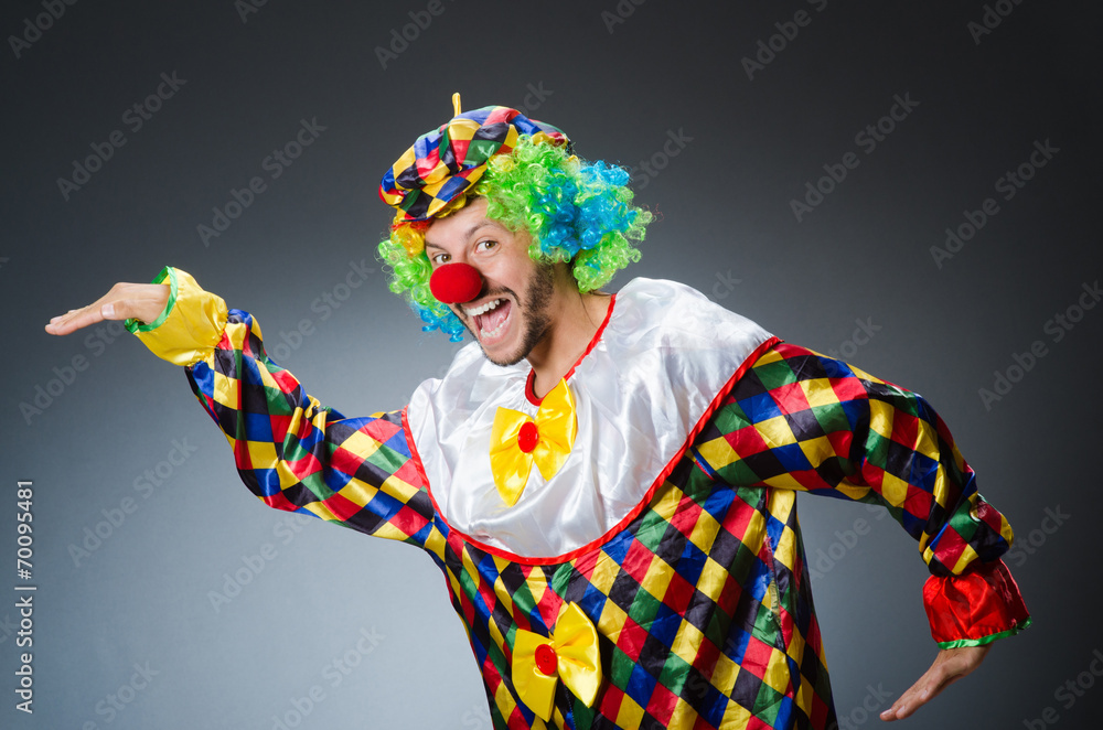 Funny clown in colourful costume Funny clown in colourful costume