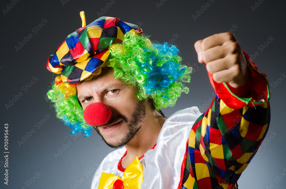 Funny clown in colourful costume Funny clown in colourful costume