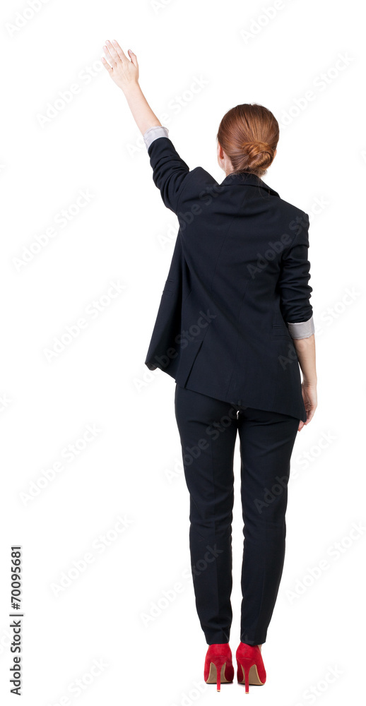 Back view of beautiful business woman welcomes. Back view of beautiful business woman welcomes.