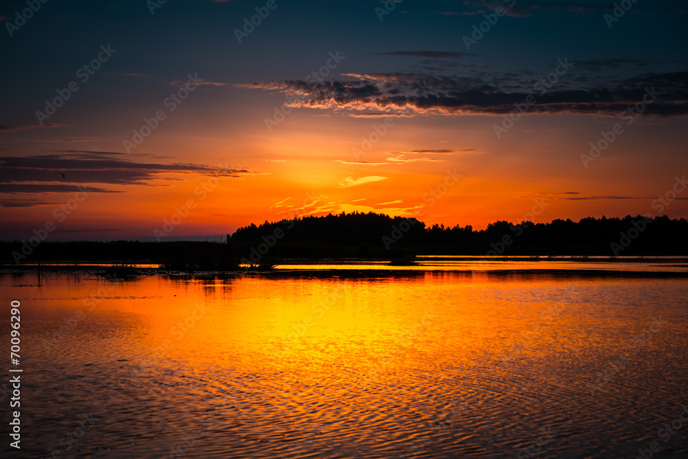 Amazing sunset over lake