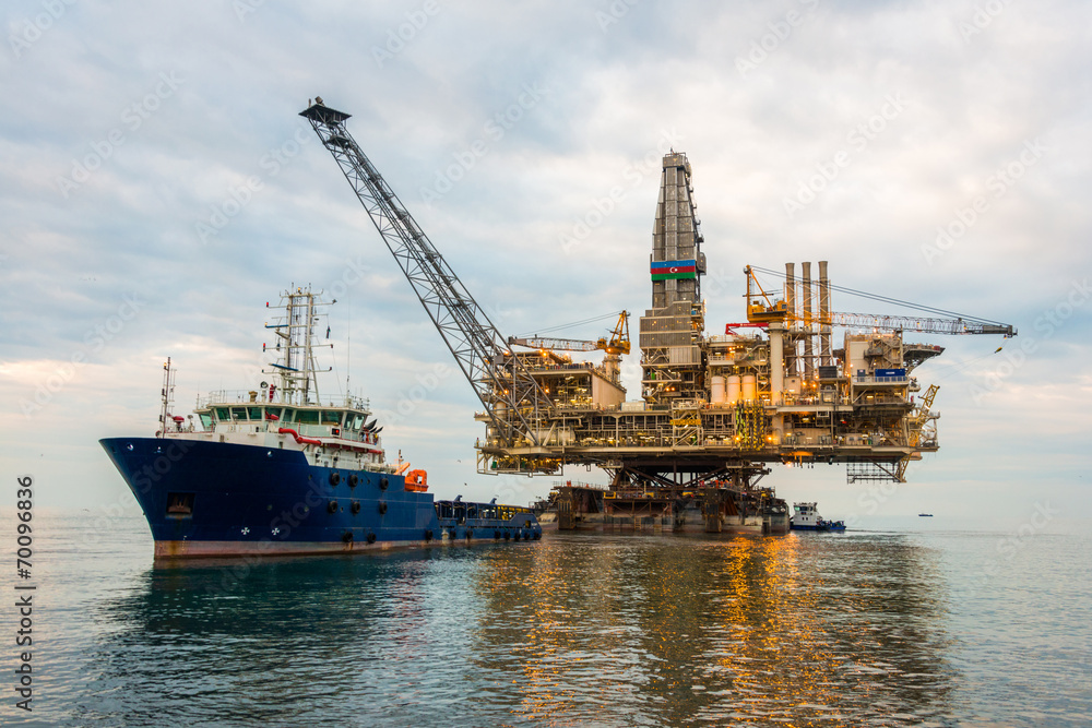 Oil rig platform in the calm sea