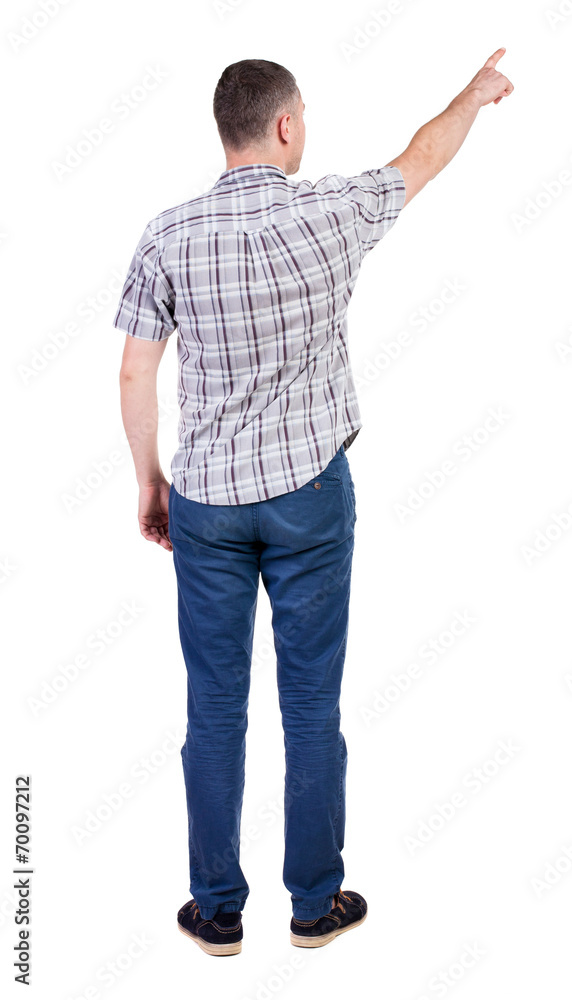 Back view of pointing young men in shirt and jeans. Back view of pointing young men in shirt and jeans.