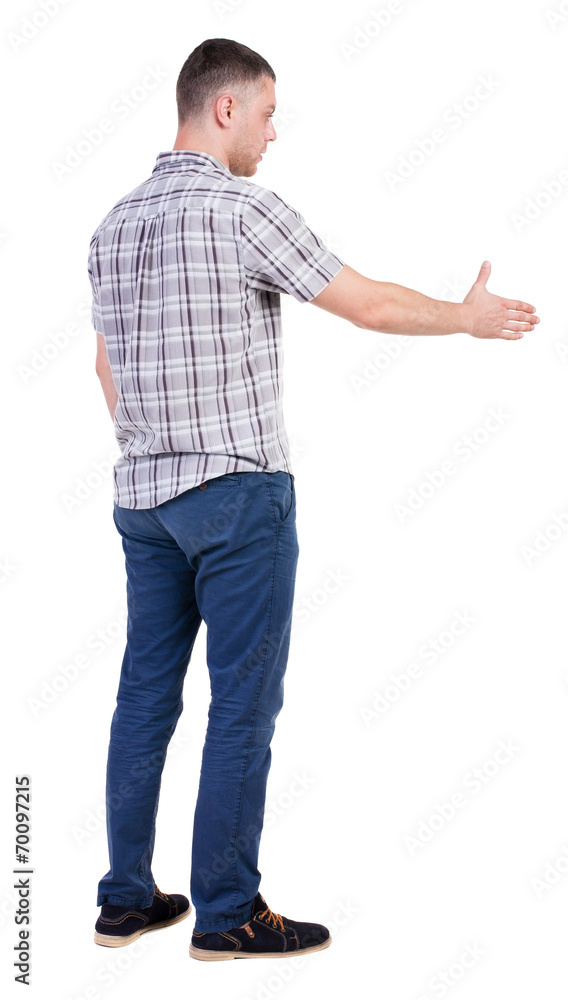 Back side view of man in shirt handshake. Back side view of man in shirt handshake.
