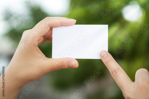 Hand hold white blank business card