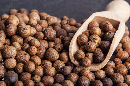 Wooden shovel with  Allspice (jamaica pepper)