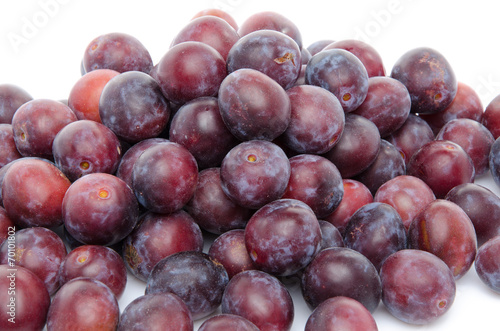 Heap of fresh ripe blue plums