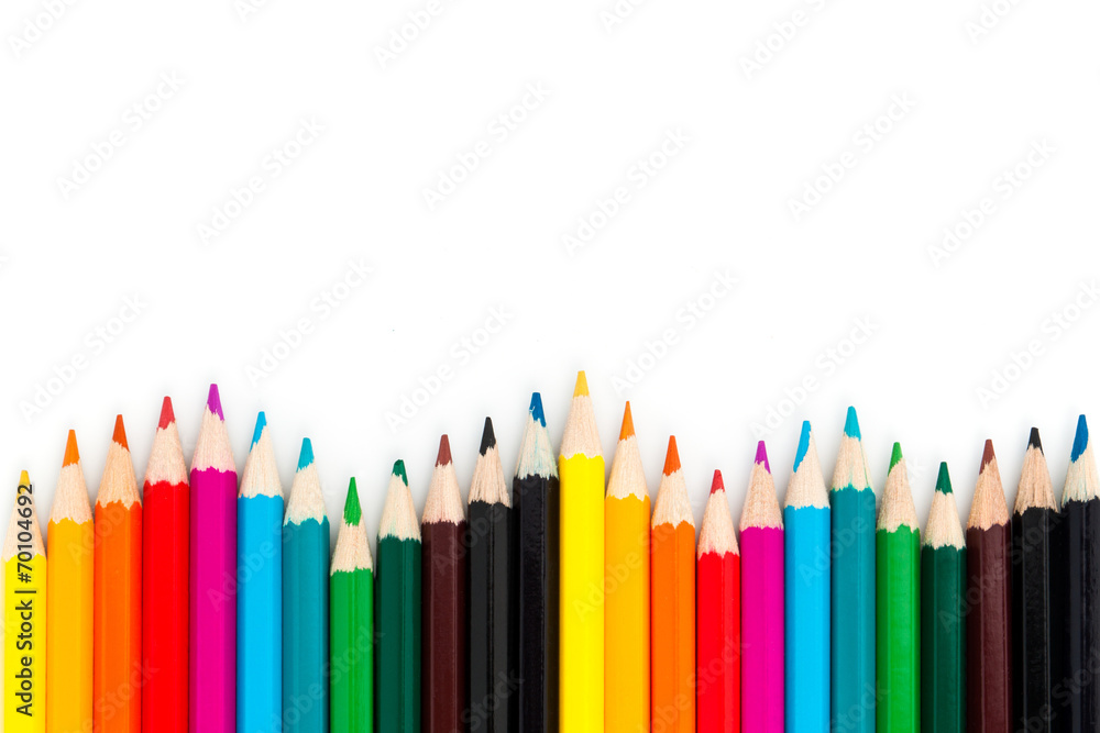 close up Colour pencils wave shape isolated on white background close up Colour pencils wave shape isolated on white background