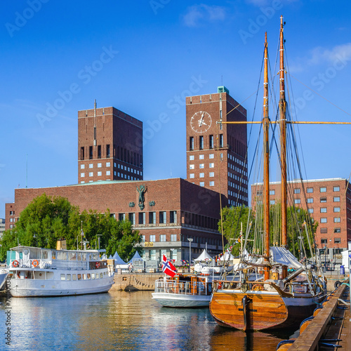 Harbor with boats and town hall in Oslo, Norway