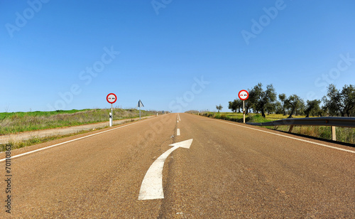 White arrow on the county road photo