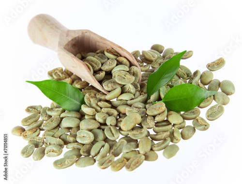 green coffee beans on white background