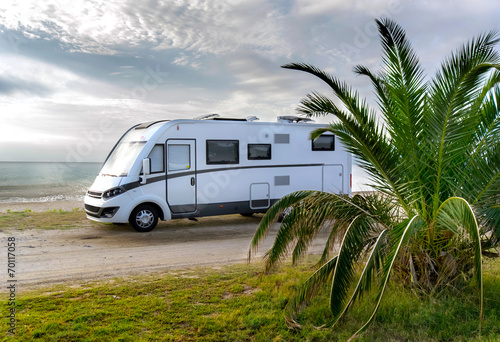Camper van parked on a beach